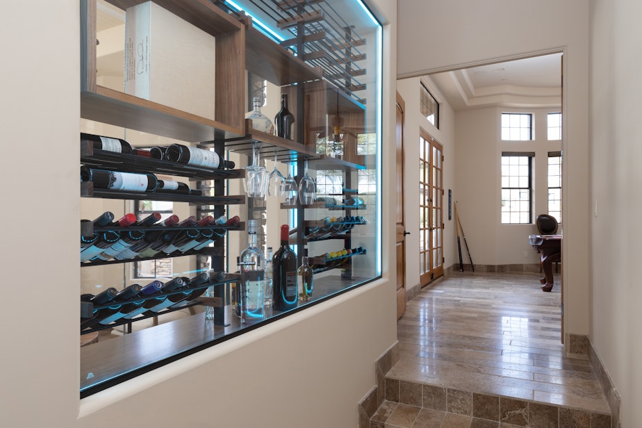 Custom staircase glass wine wall by Heritage Vine